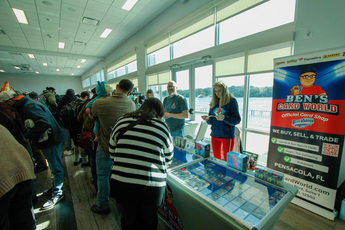 Attendees browsing vendor booths