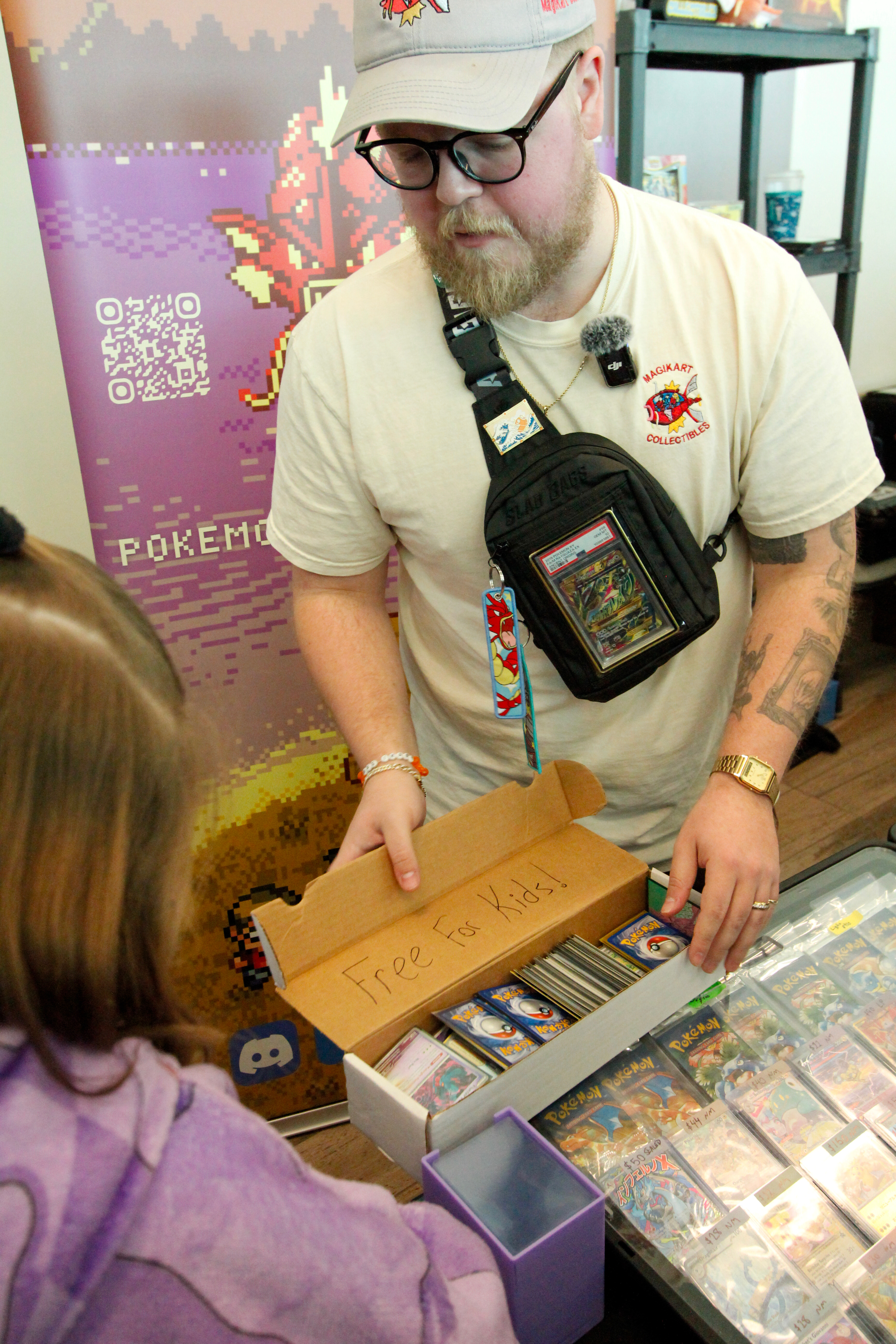 Vendor giving free cards to kids